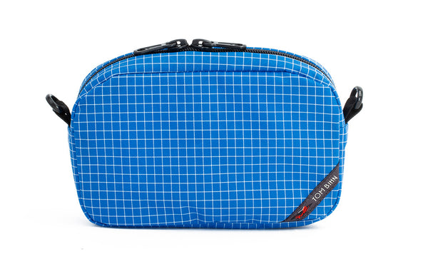 An all-fabric Island blue with white grid pattern 3D Organizer Cube.